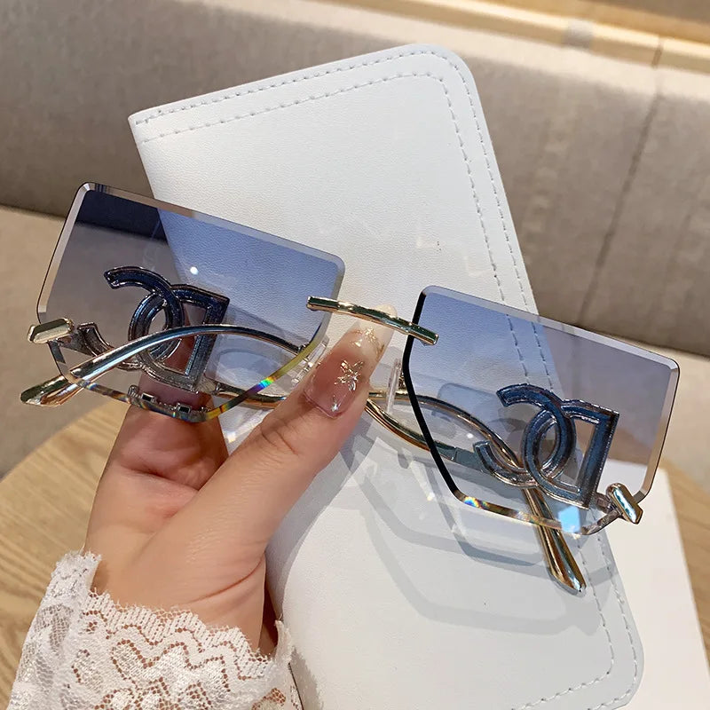 Luxury Rimless Brand Fashion Sunglasses For Women And Men Stylish Square Metal Sun Glasses Glamour Designer Shades UV400