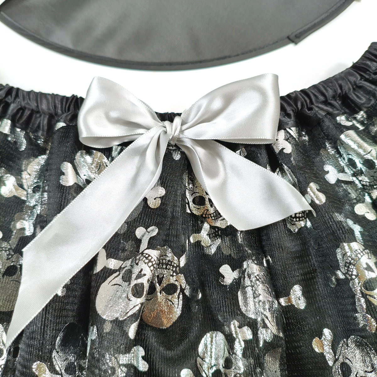 Halloween Adults Tulle Skirt Adorned with bats pumpkins stars this orange tulle skirt has a black bow waist  trim