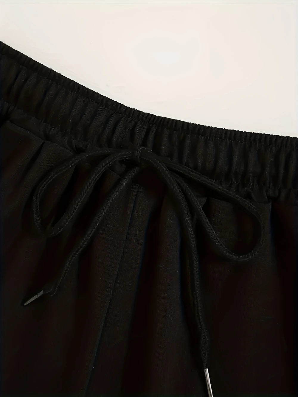 Women's casual athletic shorts with elastic waistband and drawstring lightweight and breathable solid color suitable for gym use