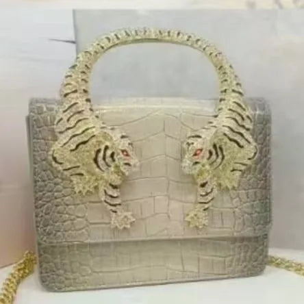 Chic Handbags For Women In Genuine Leather, By Luxury Brand With Decorative Elements, Timeless And Versatile Accessory