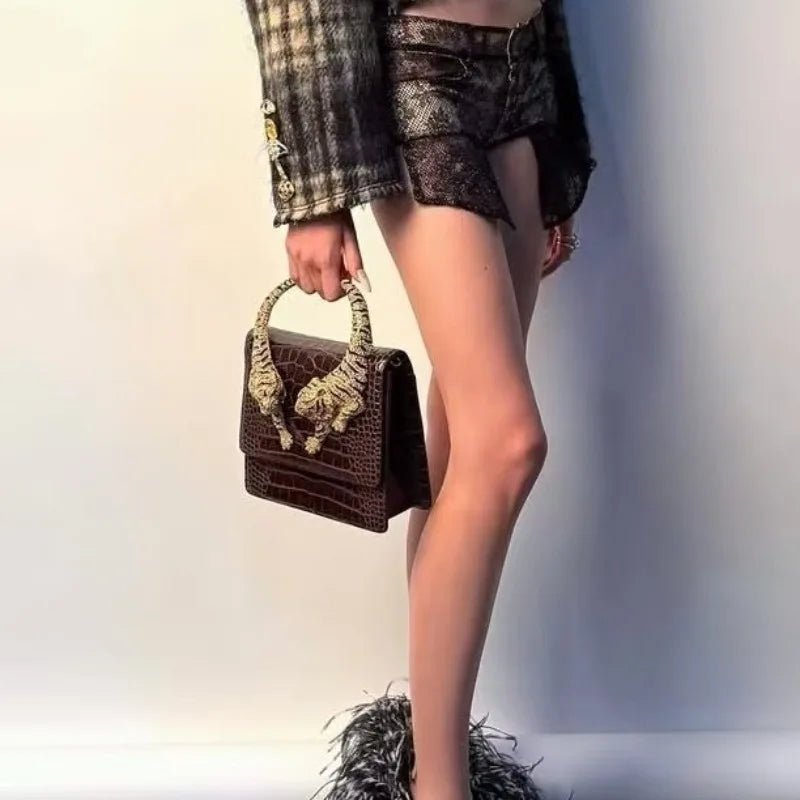 Chic Handbags For Women In Genuine Leather, By Luxury Brand With Decorative Elements, Timeless And Versatile Accessory