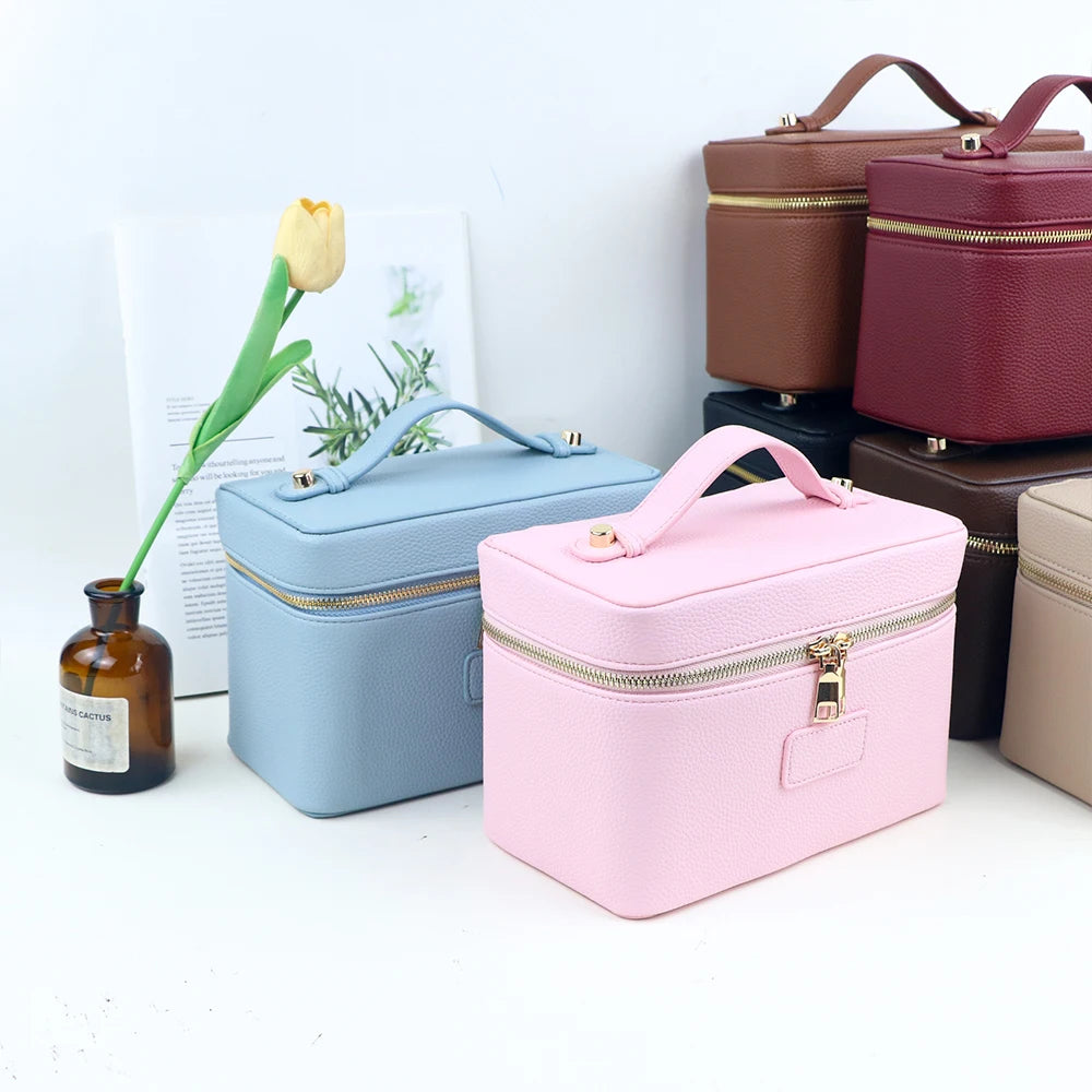 Customized name PU leather makeup bag with compartmentalized storage design, large capacity, and includes a makeup bag.
