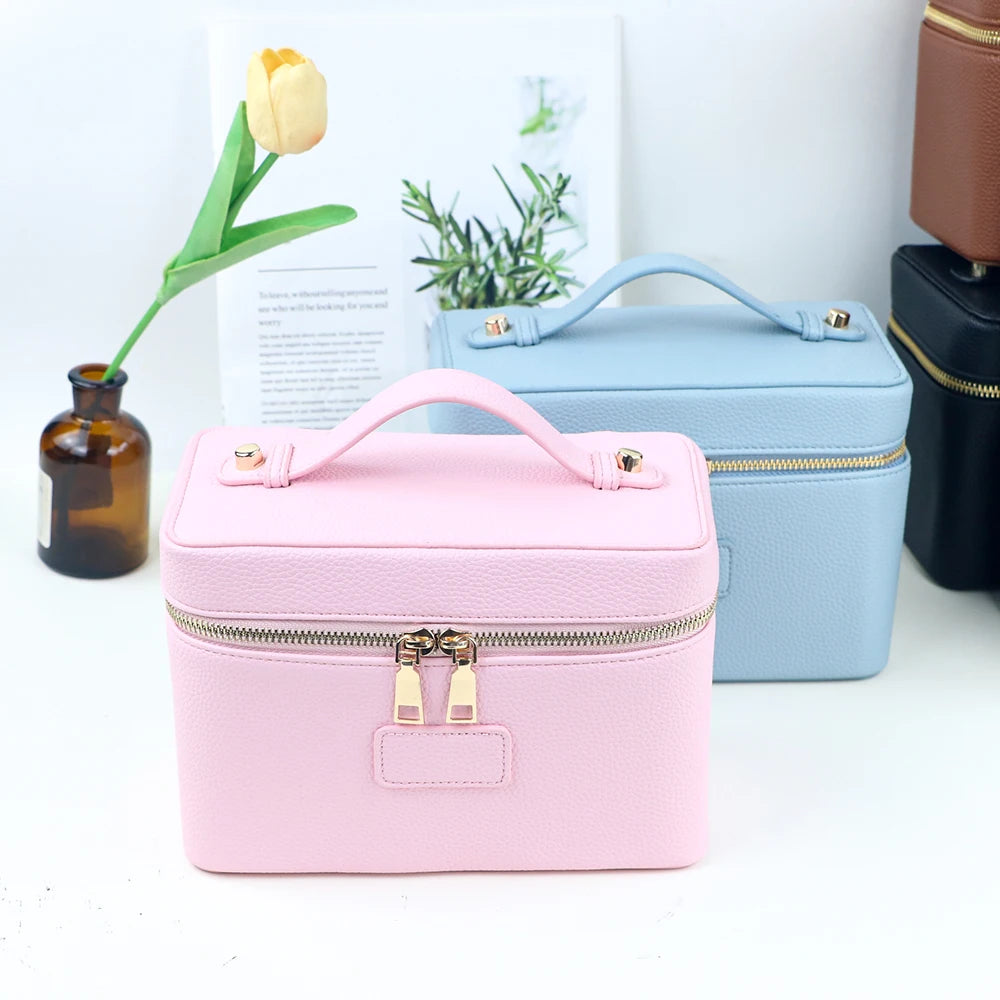 Customized name PU leather makeup bag with compartmentalized storage design, large capacity, and includes a makeup bag.