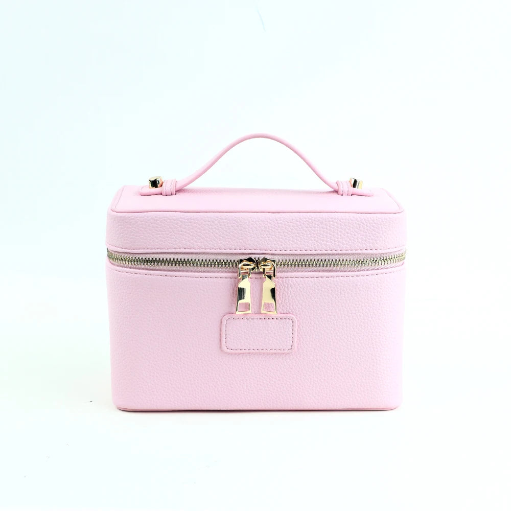 Customized name PU leather makeup bag with compartmentalized storage design, large capacity, and includes a makeup bag.