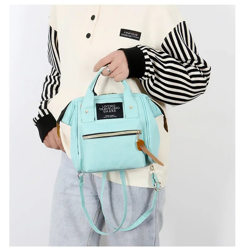 Small size mother and baby mother storage bag handbag travel backpack diaper bag baby stroller accessories
