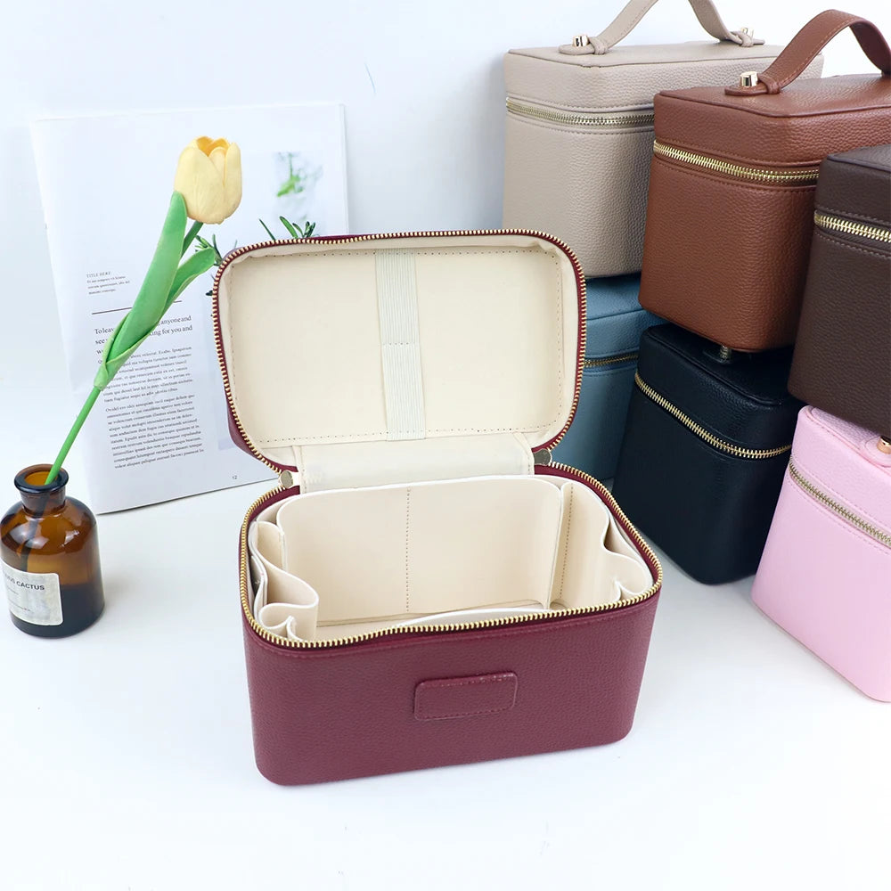 Customized name PU leather makeup bag with compartmentalized storage design, large capacity, and includes a makeup bag.