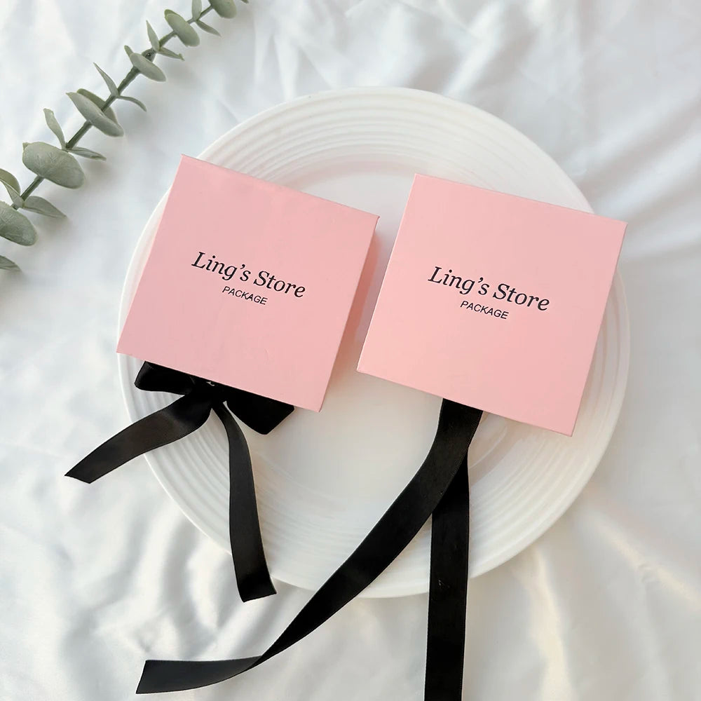 50pcs Pink Personalized Logo Jewelry Flap Bowknot Box Earrings Ring Perfume Watch USB Keychain Organizer Velvet Bag Storage Sack