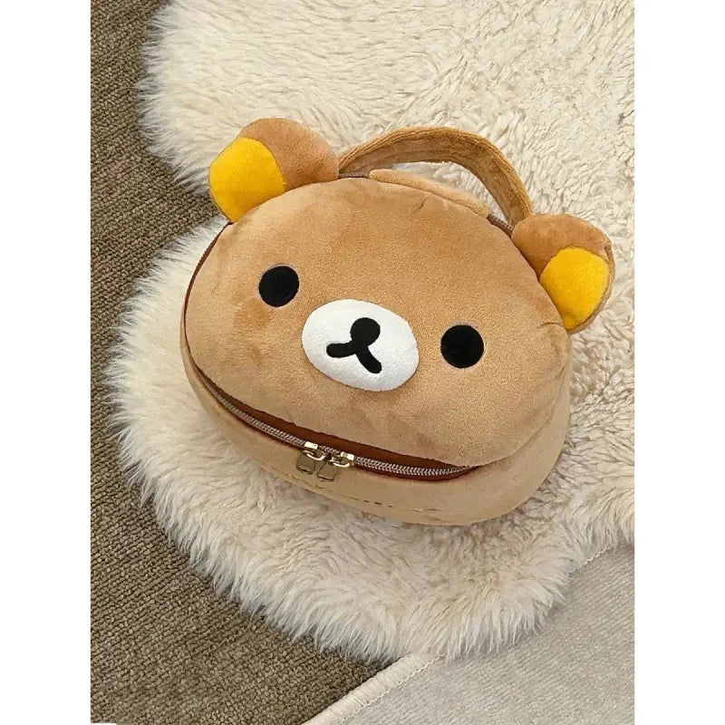 Cute cartoon Rilakkuma bear girl anime peripheral oval makeup bag for traveling portable storage toiletries bag work meal bag