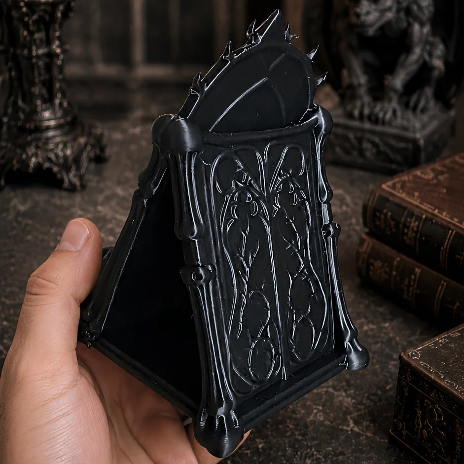 Gothic Skull Phone Stand, Dark Gothic-style Desktop Phone Holder, featuring details of skulls and thorns, decorative phone stand
